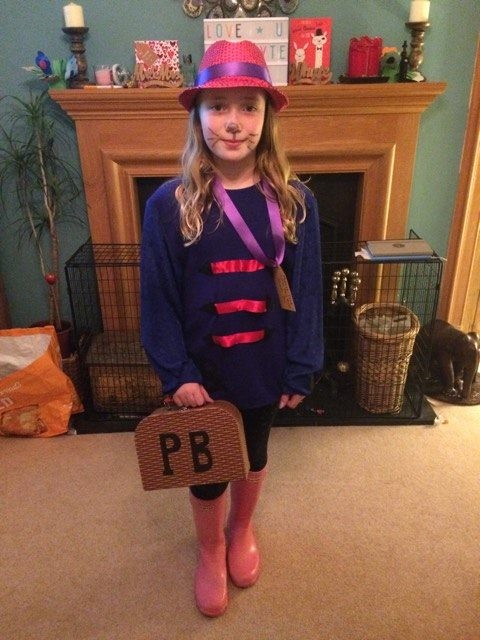 Lily looks the part as Paddington Bear-we love the little briefcase!