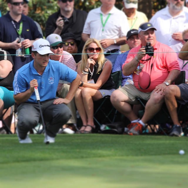 Bradley Neil lining up his putt