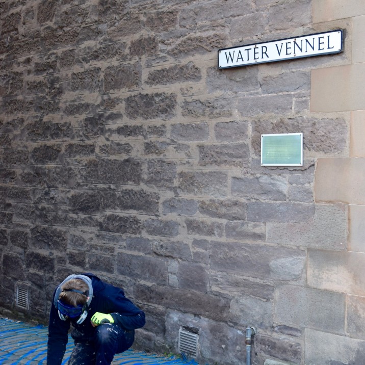 Vennels Guerilla Art Project Water Vennel painting cobbles blue