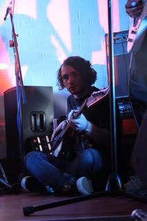 Playing the guitar on the floor