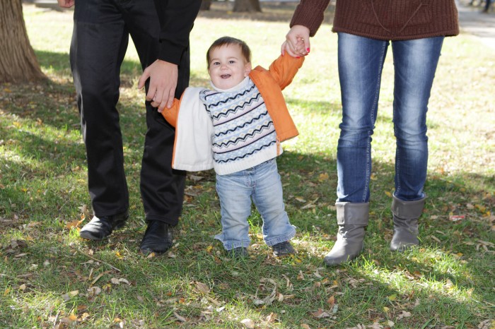 Fostering boy holding hands