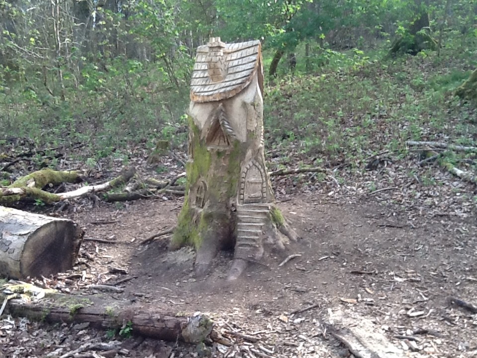 A LOVELY CARVED FAIRY HOUSE WITH AMAZING BACKROUND