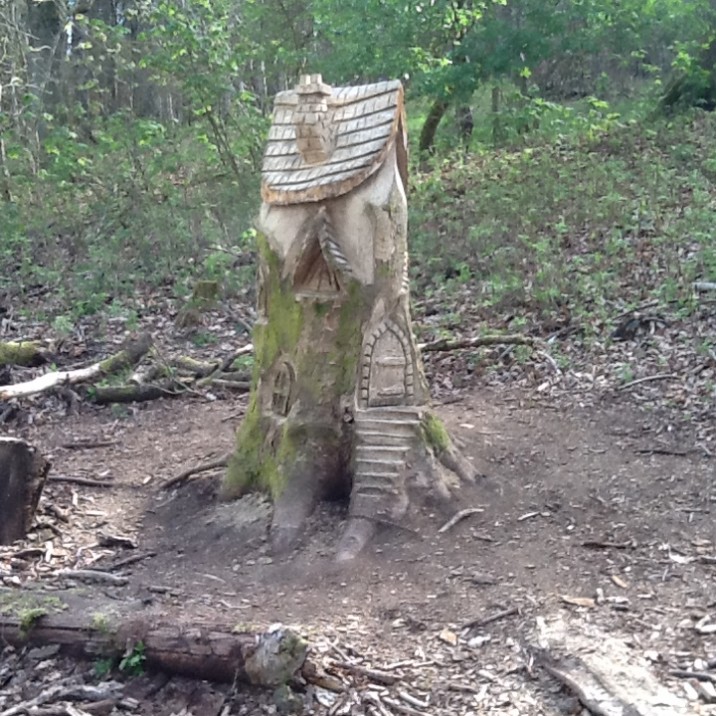 A LOVELY CARVED FAIRY HOUSE WITH AMAZING BACKROUND