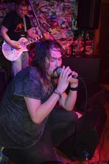 JOSEF REVIEW  - Brittle head singer kneeling