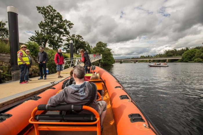 Boating on the Tay - Orange boat at pontoon