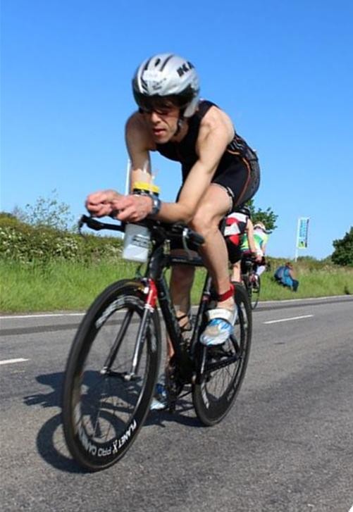 Robert Harrison on bike blue skies