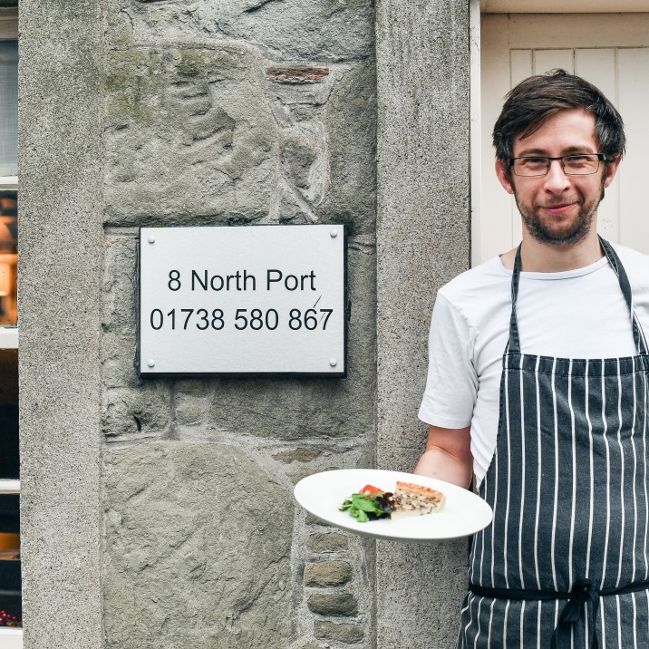 Andrew proudly holding his tart that he made from the reduced aisle in the supermarket!