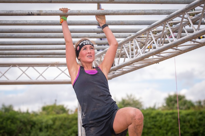 Spartan Race 2018 - woman on monkeybars