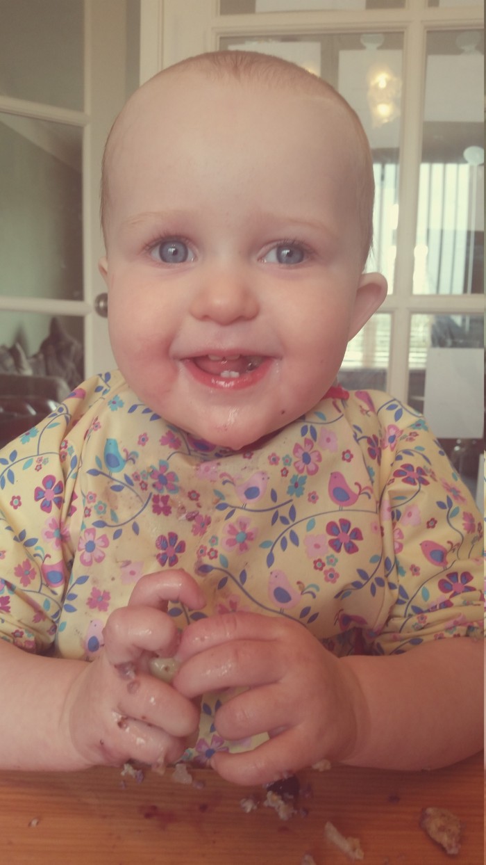Baby Led Freya smiling in highchair