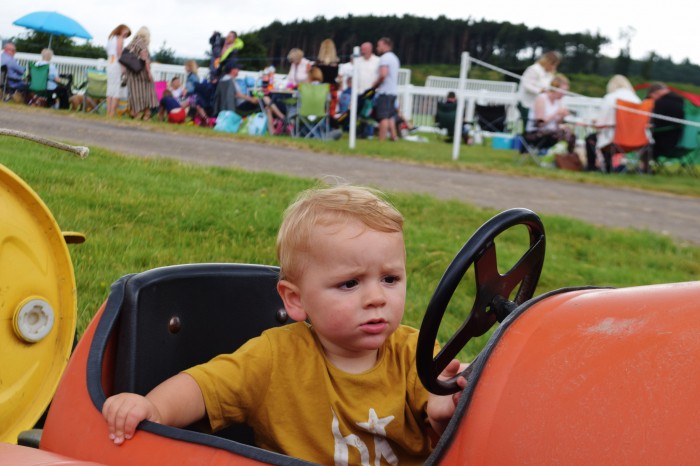 River demonstrating his best Happy Face on the quad train