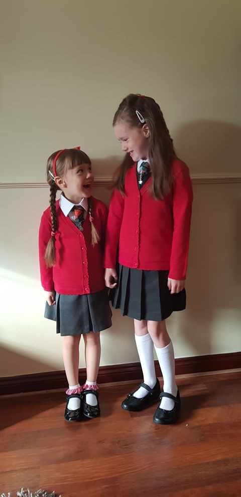 Lucy and big sis, Chloe are ready for school!