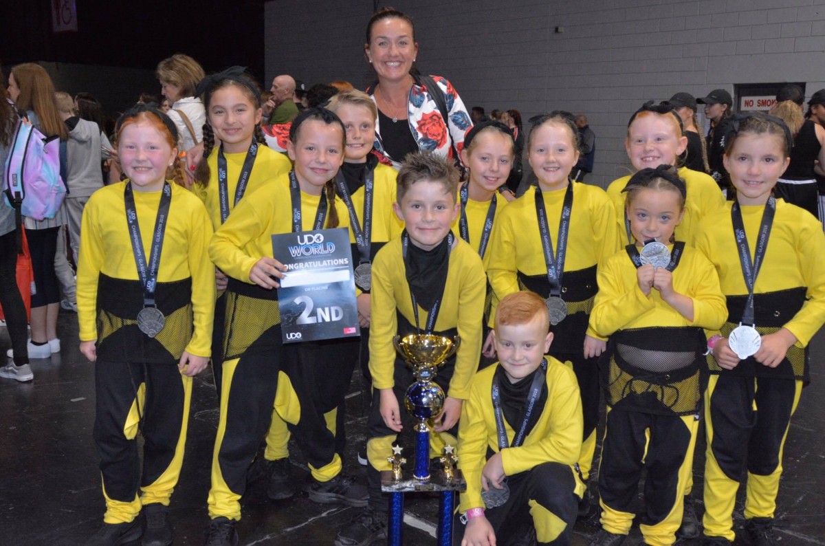 J Crew 2 showing off their  magnificent trophy!