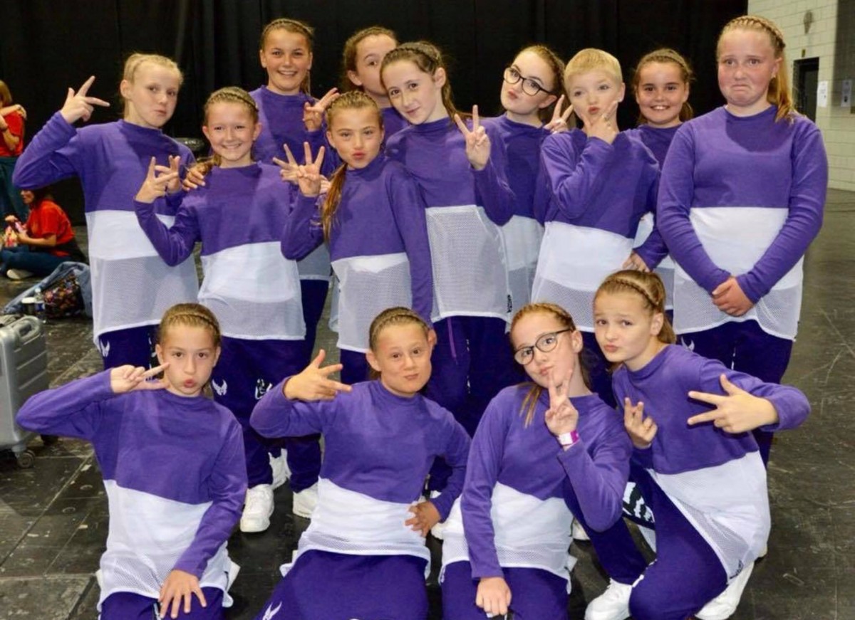 No Filter' from JGN Dance Studio in Perth City Centre huddled in their group and striking a pose after placing 7th in the world at the 2018 UDO World Championships!
