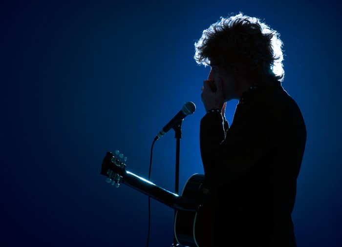 Bill Lennon as Bob Dylan