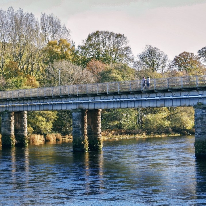 A look at the beautiful Perth Railway bridge from Tay Stree. The bridge is balanced above the flowing banks of the River Tay