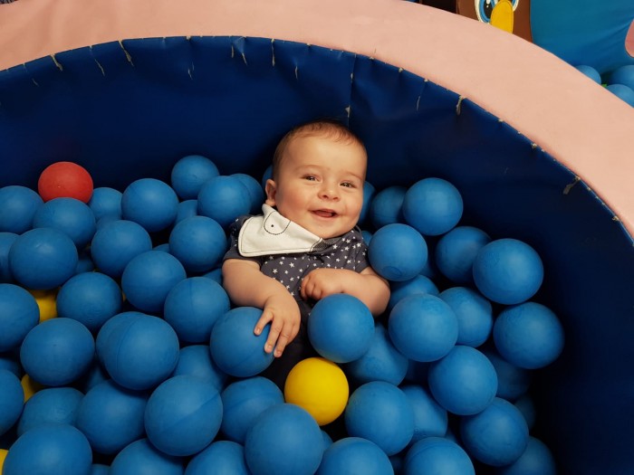 Joel enjoying the ball pit.