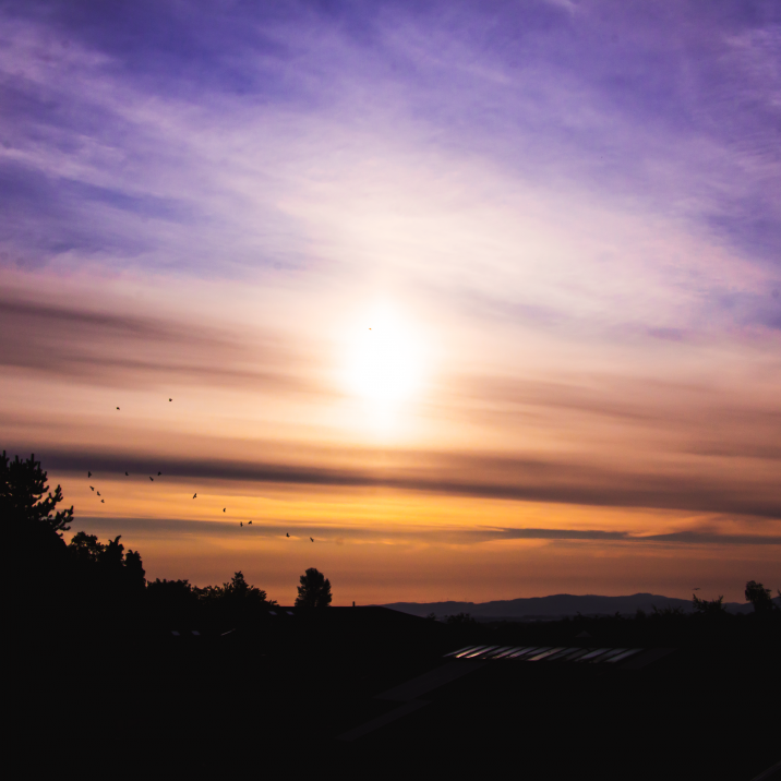 A parhelion, or "sun dog" is captured here. This is an atmospheric optical illusion that consists of a bright spot to one or both sides of the Sun. Sun dogs are a members of the family of halos, and are caused by the refraction of sunlight by ice crystals in the atmosphere.