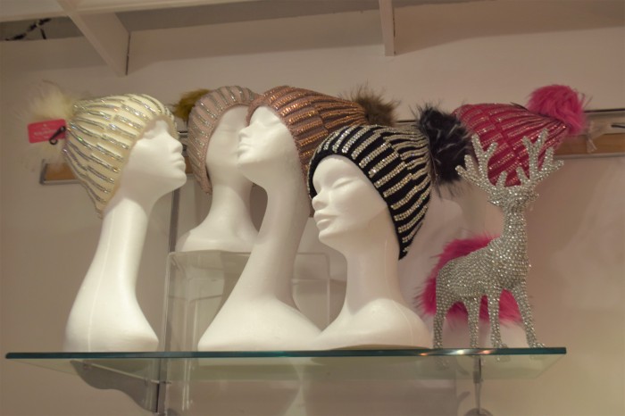 Cosy woolly hat with added sparkle of sequin and faux fur pom pom from Marian's of Perth.