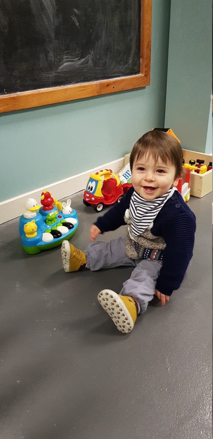 Baby Cafes Janey - Joel playing on the floor