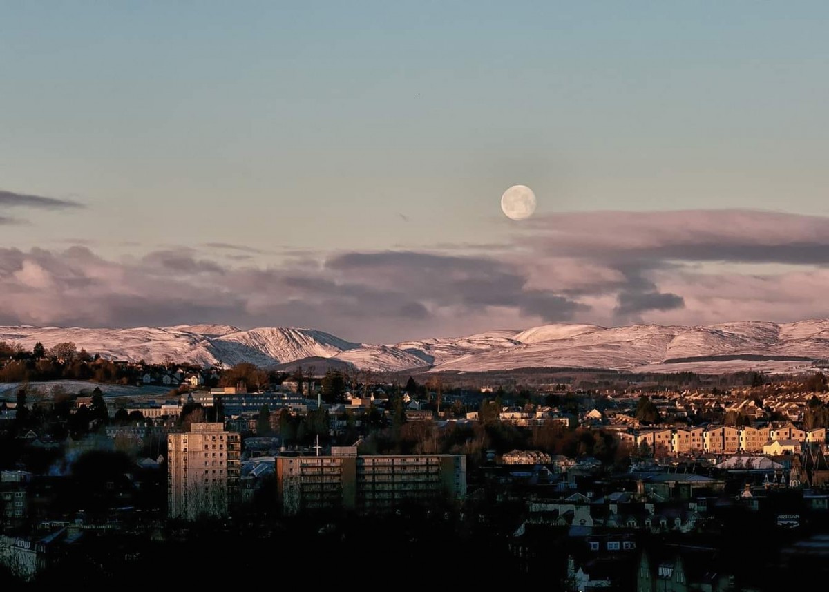 Full moons are when you're most likely to see the Moon in the daytime. When the Moon reaches the final phase of it's cycle (Full Moon), it is at its closest to the Sun, which beams off it and causes it to be visible, even in the day.