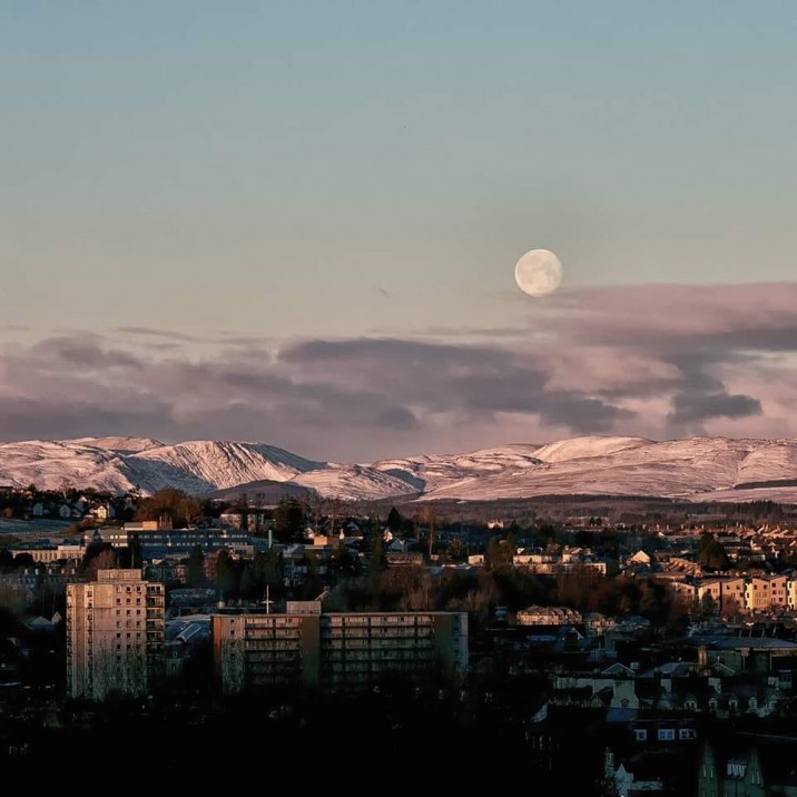 Full moons are when you're most likely to see the Moon in the daytime. When the Moon reaches the final phase of it's cycle (Full Moon), it is at its closest to the Sun, which beams off it and causes it to be visible, even in the day.