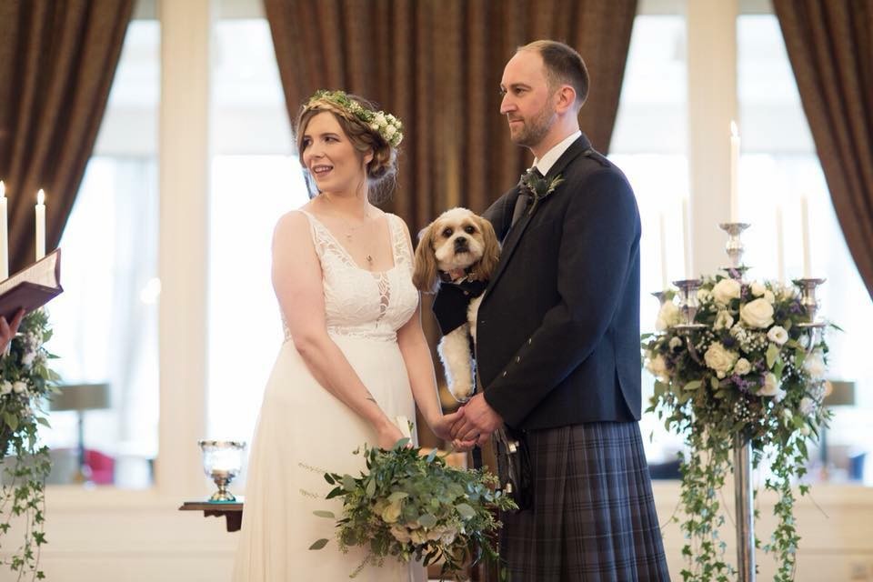 Katie from Dog Friendly Perthshire on her wedding day, with the lovable Baxter!