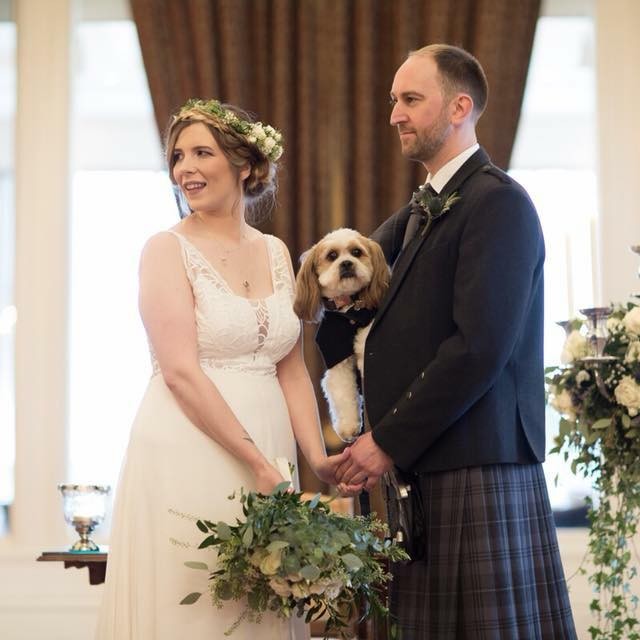 Katie from Dog Friendly Perthshire on her wedding day, with the lovable Baxter!