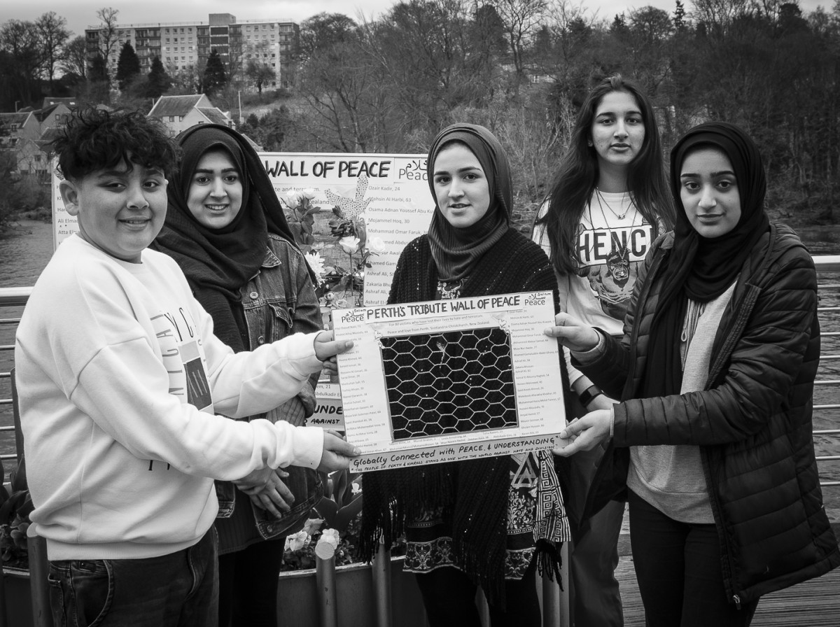 The young creators of Perth's Tribute Wall of Peace.