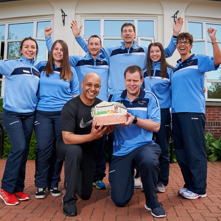 Andy McKechnie with the Live Active Rodney Team who were celebrating 25 years in the business.