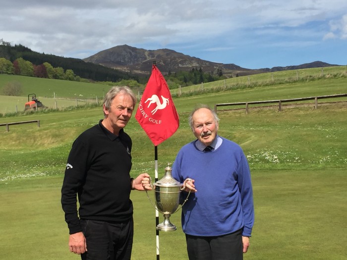 Pitlochry Golf general manager Mike Winton (left) and former tournament secretary John Brydone with the Highland Open trophy.