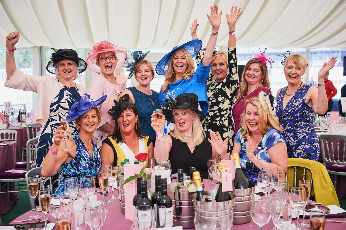 A group of ladies in the VIP tent having a great time!