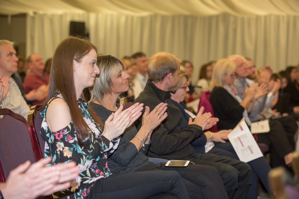 The students on stage were met with rounds of applause from the gathered crowds of friends, families, and local business owners