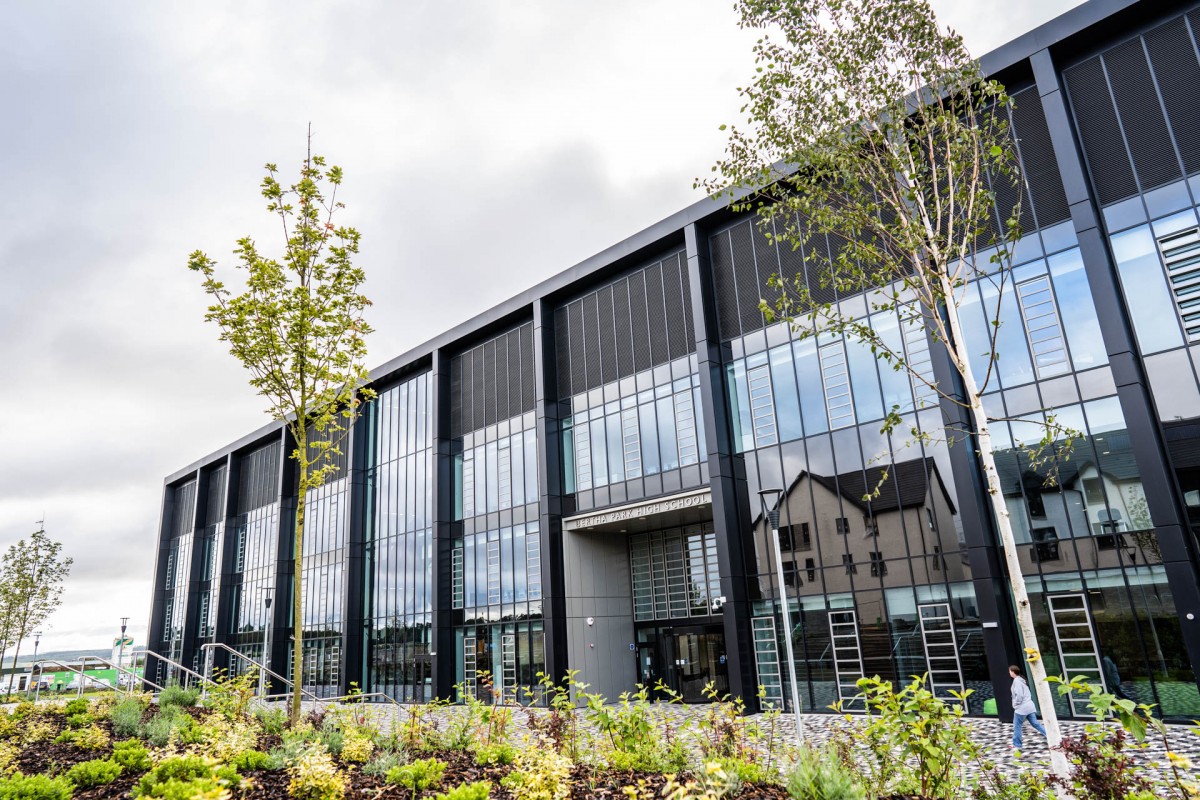 The spectacular glass face reflects all of the surroundings.