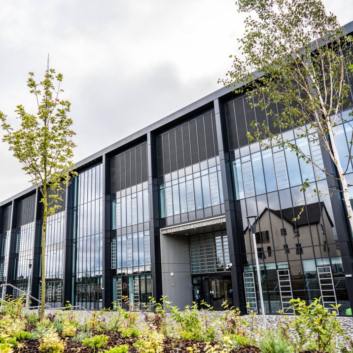 The spectacular glass face reflects all of the surroundings.