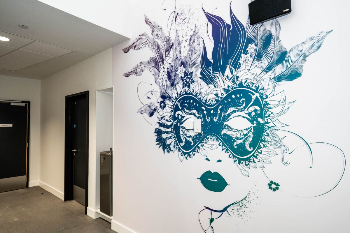 The corridors of Bertha Park High School are adorned with brightly coloured murals.