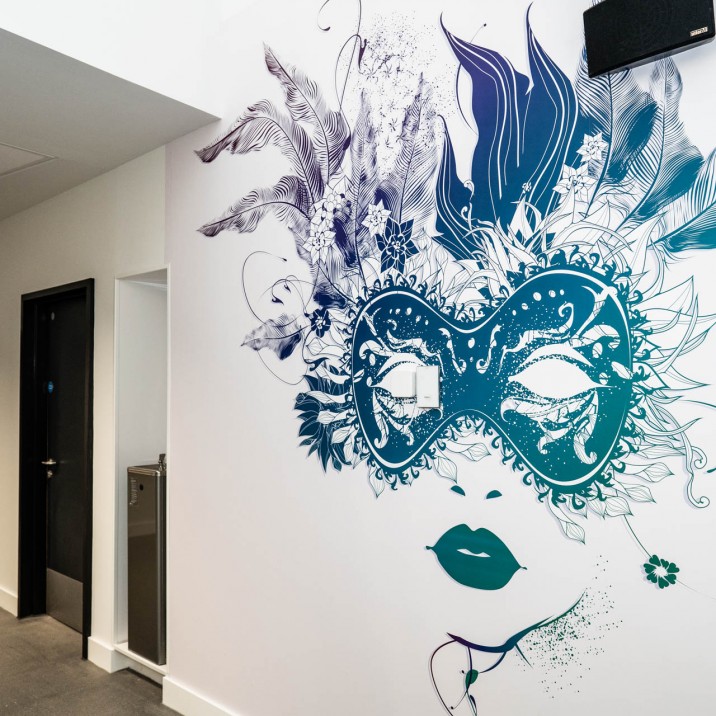 The corridors of Bertha Park High School are adorned with brightly coloured murals.