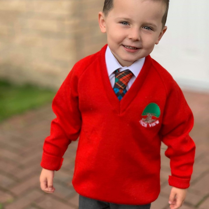 Adam is bright as a wee red button - Sent in by Dad Michael