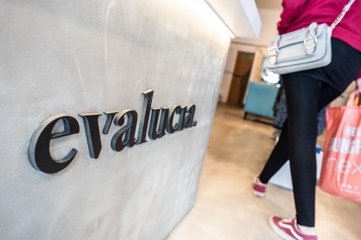 The new store is fresh and contemporary, with concrete, wood and chrome trims.