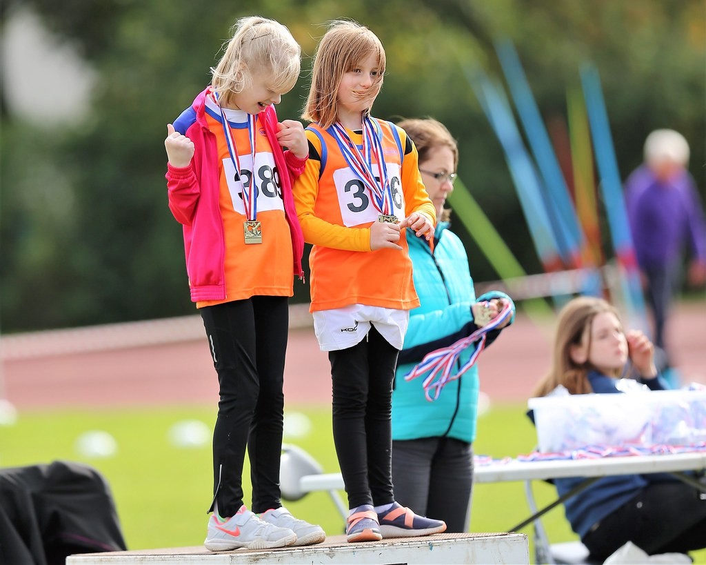 2 of Perth's youngest athletes, Ella Dixon and Sophie McPhee excited to be getting their medals.