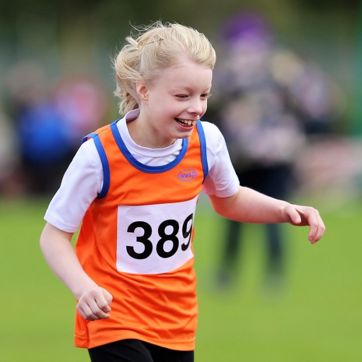 Ella Dixon having great fun competing in the 100m.