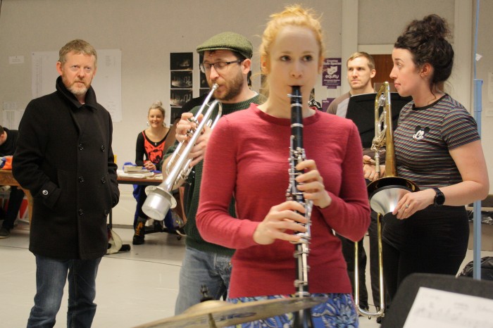 Colin McCredie PFT - Scrooge looking disdainfully at a brass band