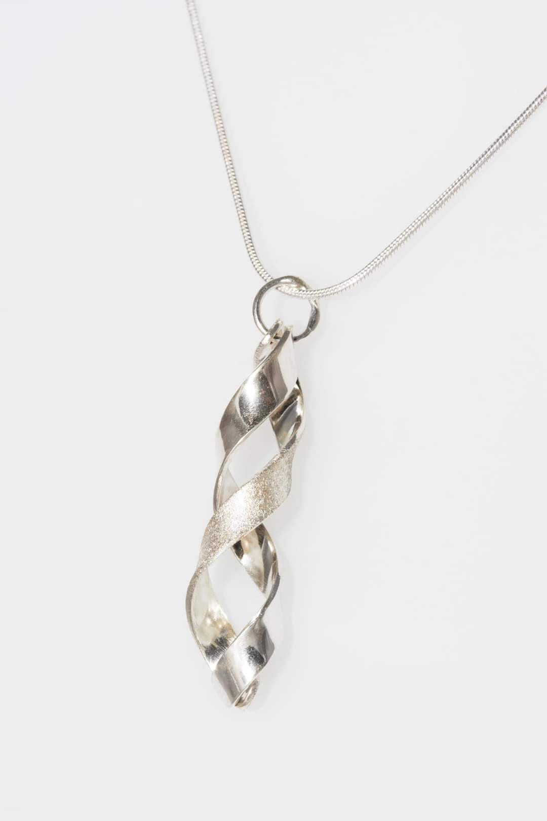 Sterling silver double helix pendant.
