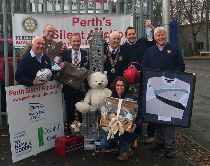 The Rotary club preparing for Perth Silent Auction.